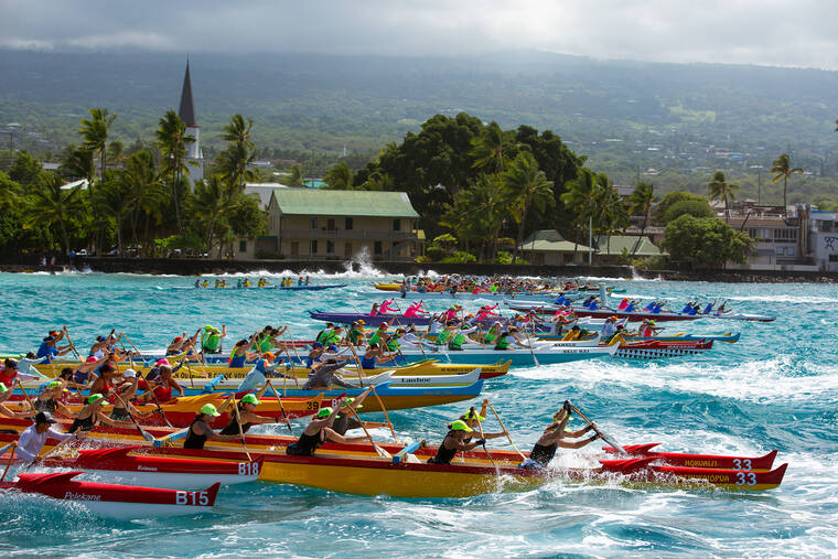 canoes racing in hawaii sea